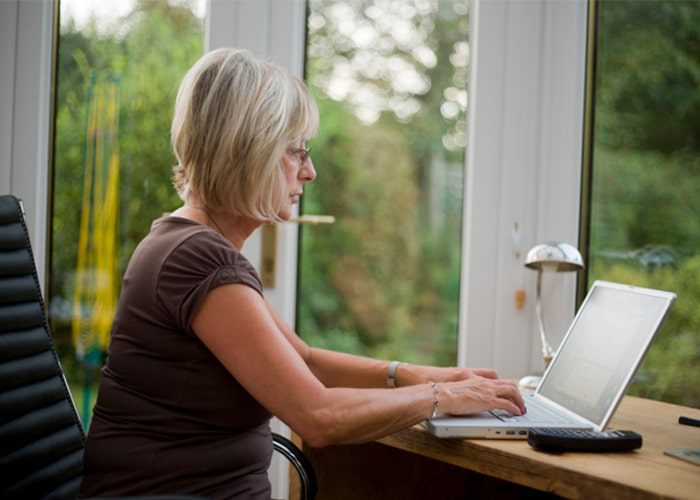 woman working in conservatory